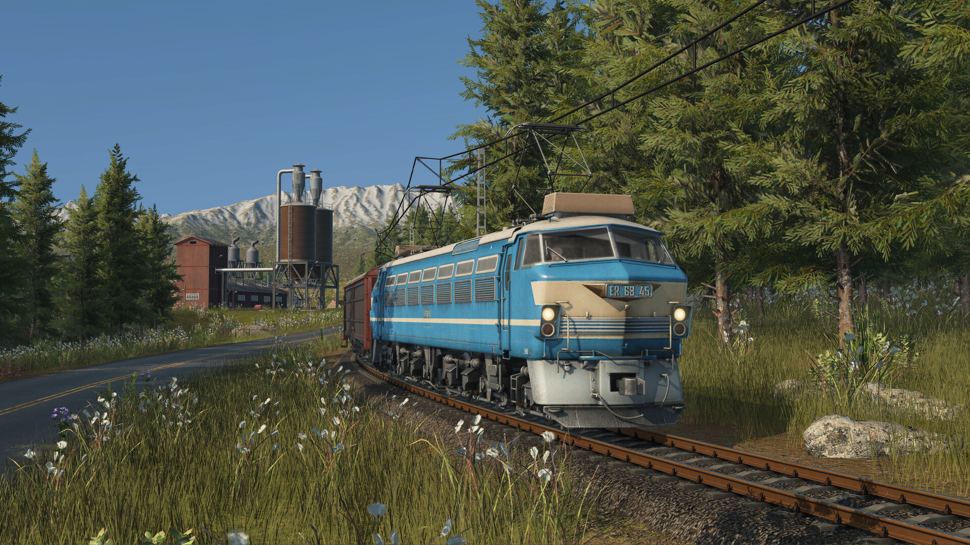 Transport Fever 3: spoor- en wegnetwerk dat de stad verbindt met industriegebieden